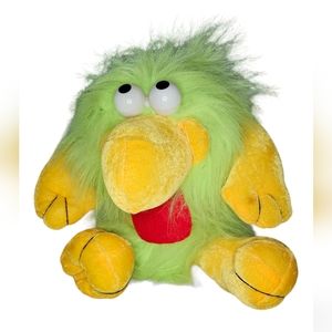 NWOT Muppet style slinky toy. Green, yellow, & red colors, handle & string.